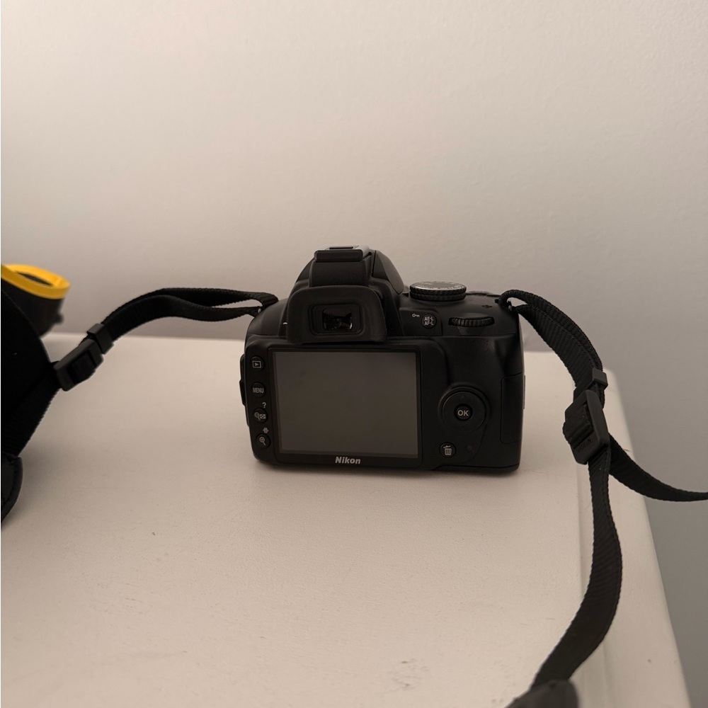Nikon Black Digital SLR Camera with Neck Strap